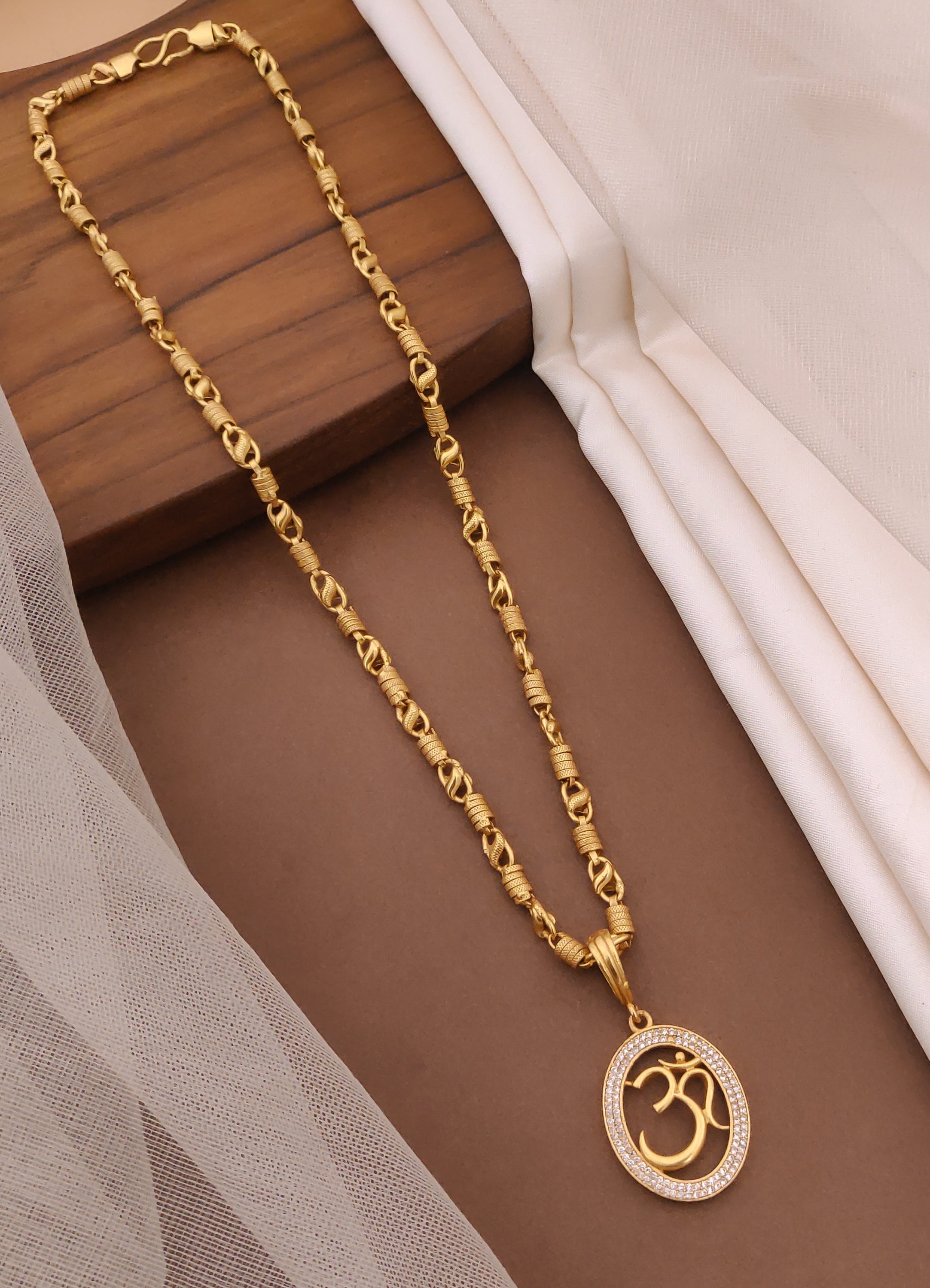 Om Design Stone Embedded Gold Plated Pendant Set With Chain For Men